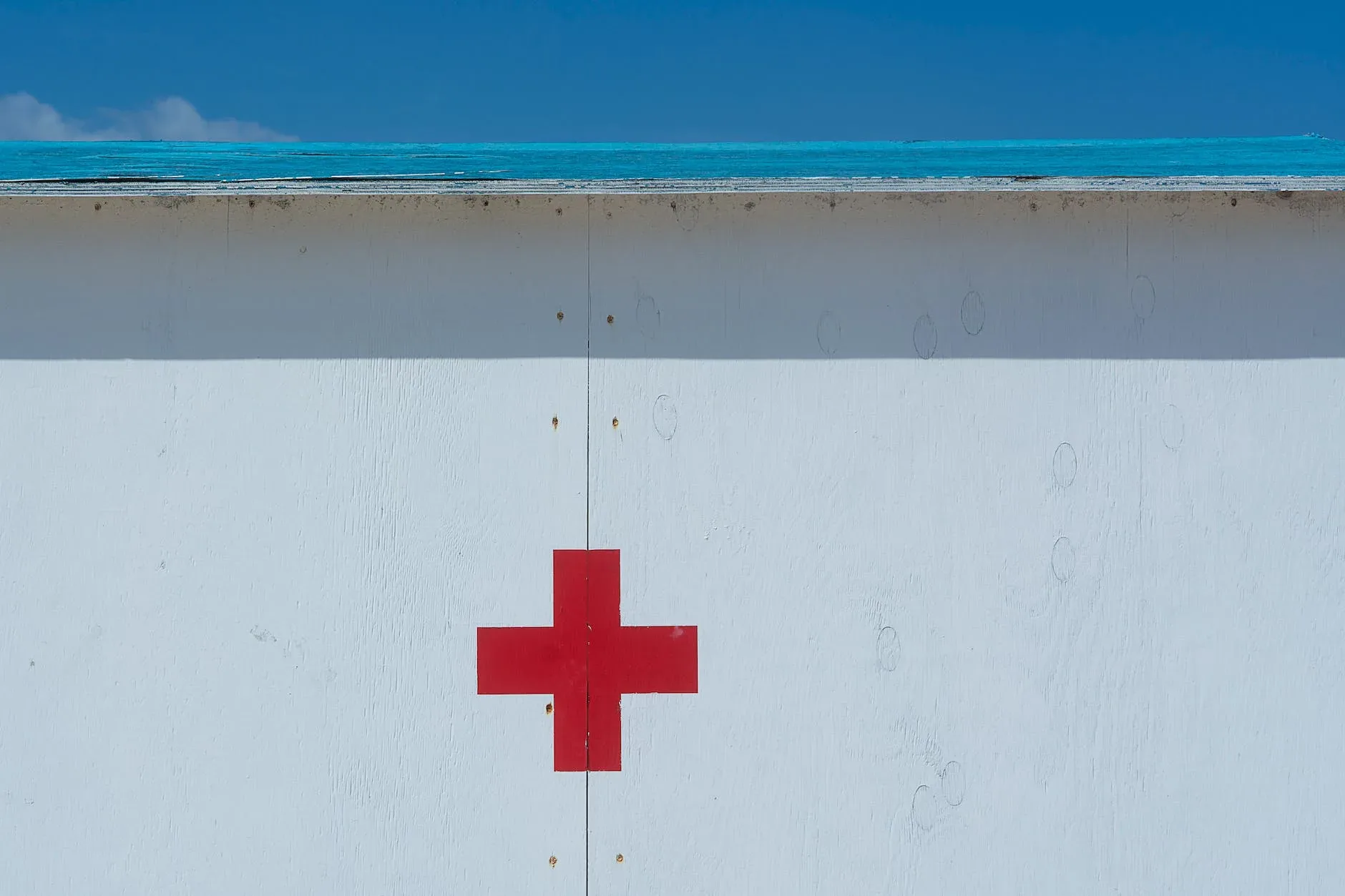 red cross on wall